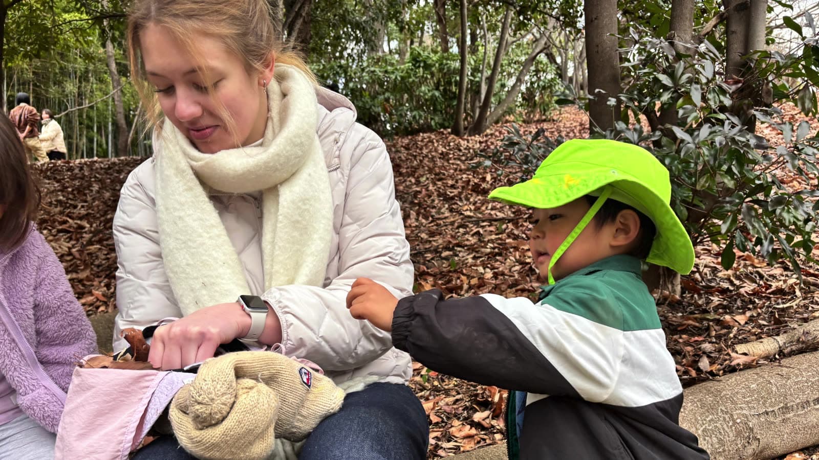 Making crafts outdoors with a child