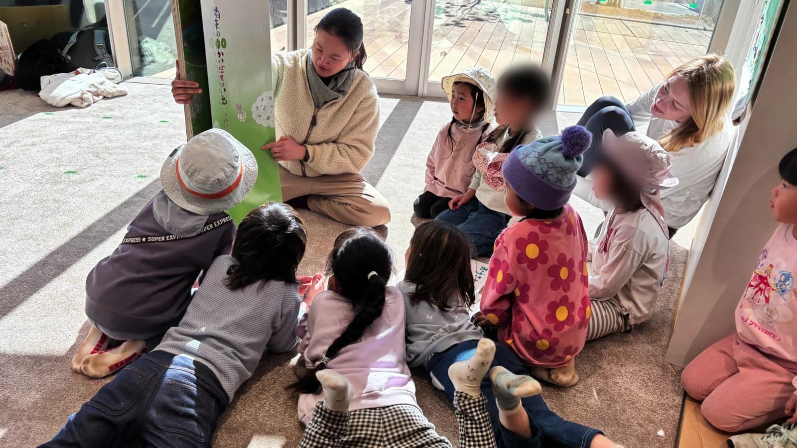 Children listening to a picture-story show
